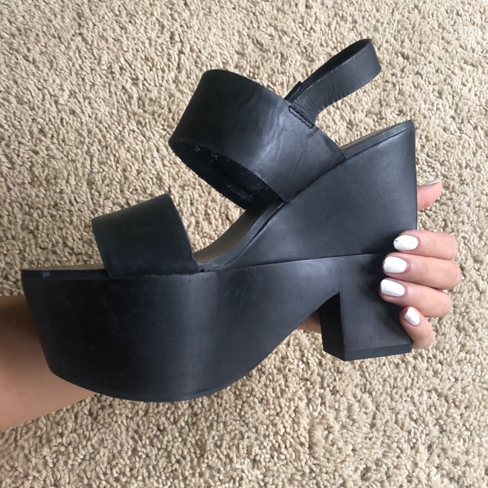 Shelly London black platform heels